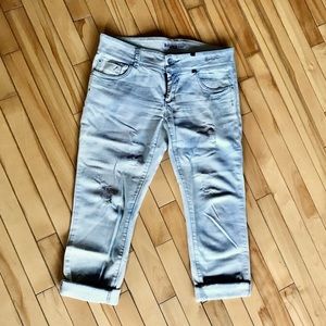 Monica’s distressed jeans